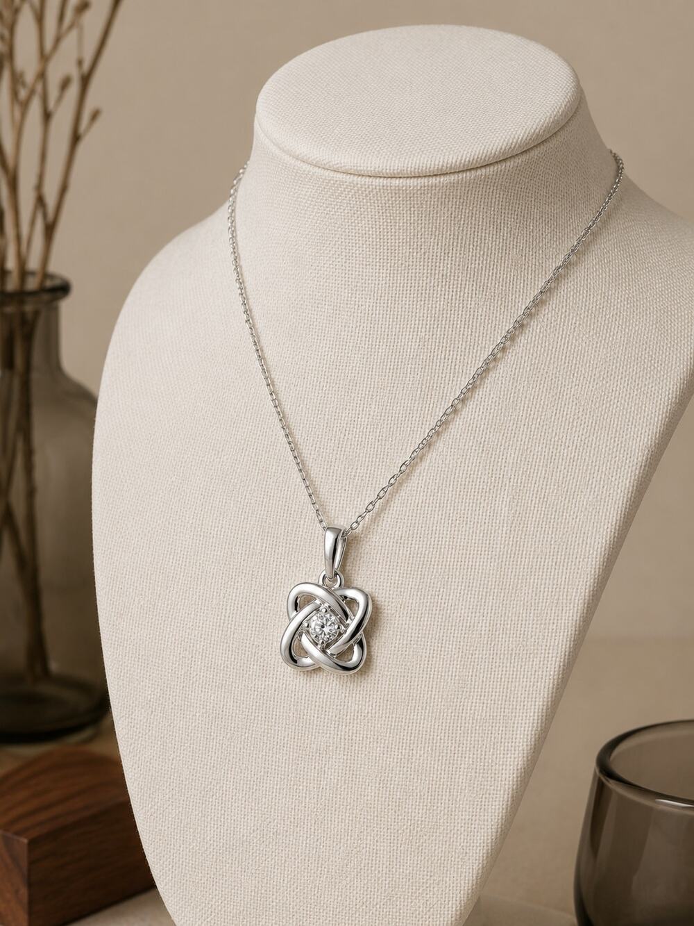 Ostbye Sterling Silver .02 CTW Diamond Love Knot Pendant Necklace 18 Inch